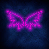 Аngel wings and neon sign